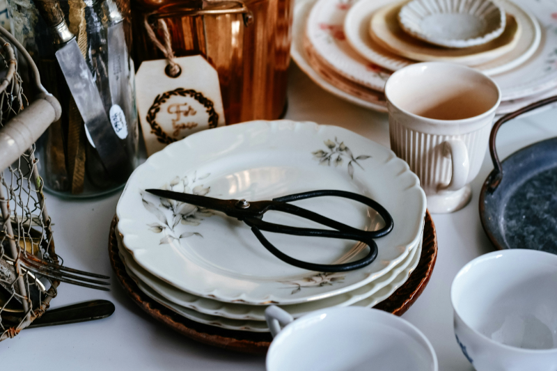 antique dishware and sheers, sourced by Tweed & Toad Co.